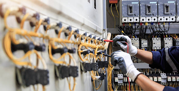Professional Electrician technician working in Pinecrest, FL
